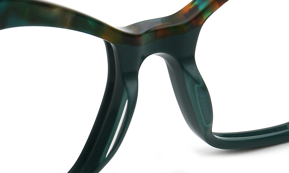 dark green nose pads of eyeglasses