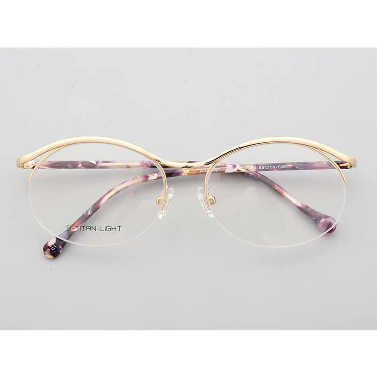  half-rim eyeglasses in gold and purple front view