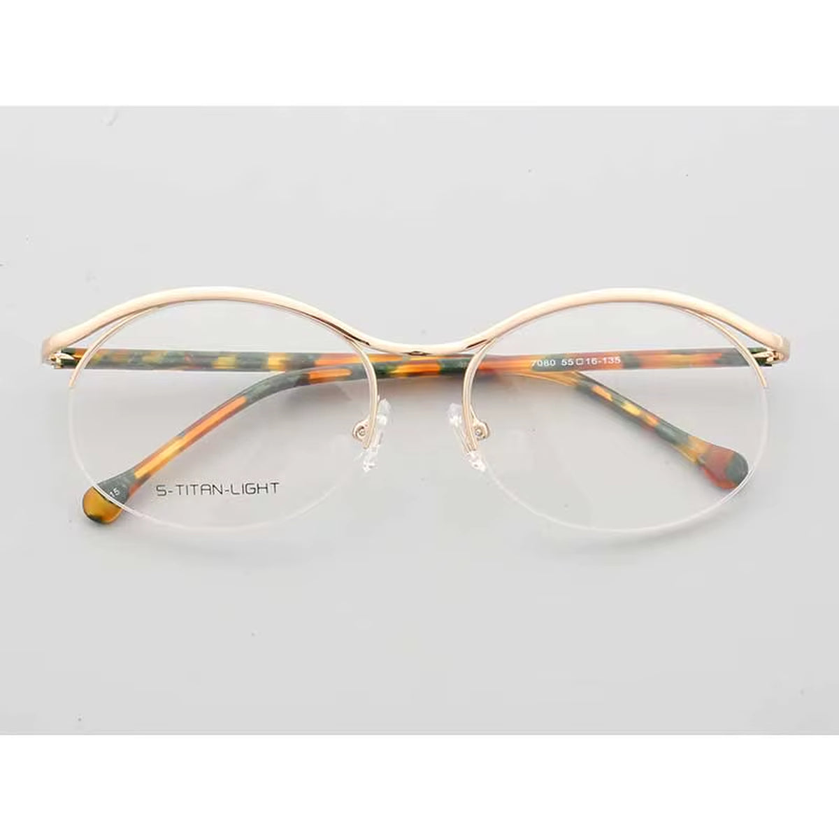  half-rim eyeglasses in rose gold and multicolor front view