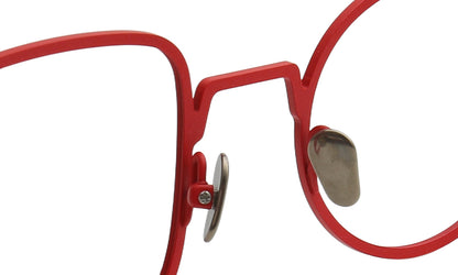 red nose pads of titanium eyeglasses frames