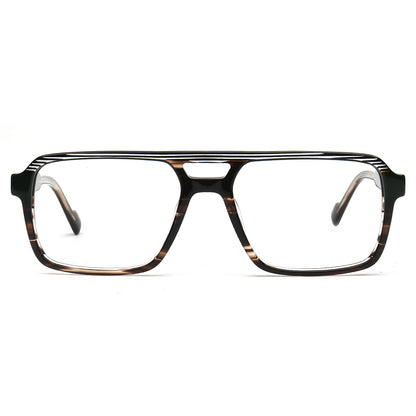 A pair of oversized square eyeglasses with a thick black and brown tortoiseshell acetate frame, shown from the front on a solid white background.