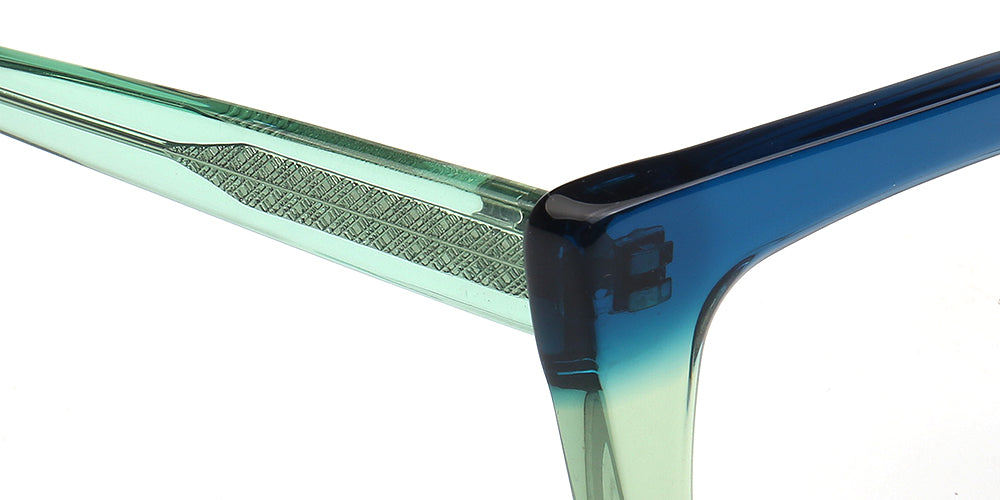 Close-up of a pair of sunglasses with a gradient blue and green frame.