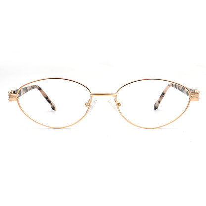 Oval Gold-framed glasses frames with tortoiseshell accents on a white background