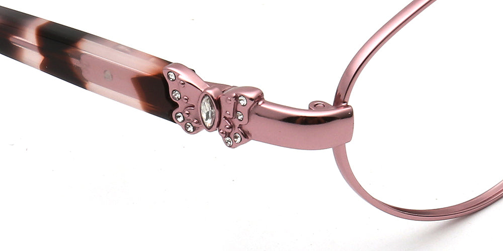 Close-up of a pair of glasses frames with a decorative pink and tortoiseshell butterfly temple on a white background.