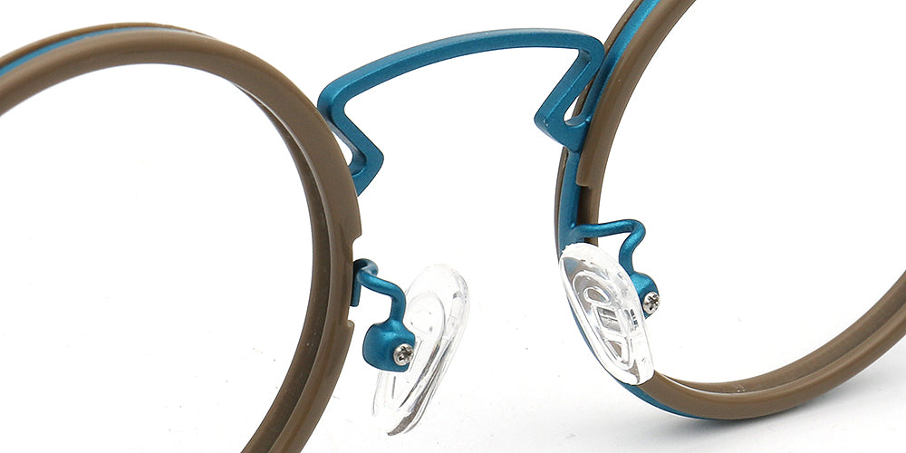 Close-up of a pair of eyeglasses with brown and blue frames on a white background