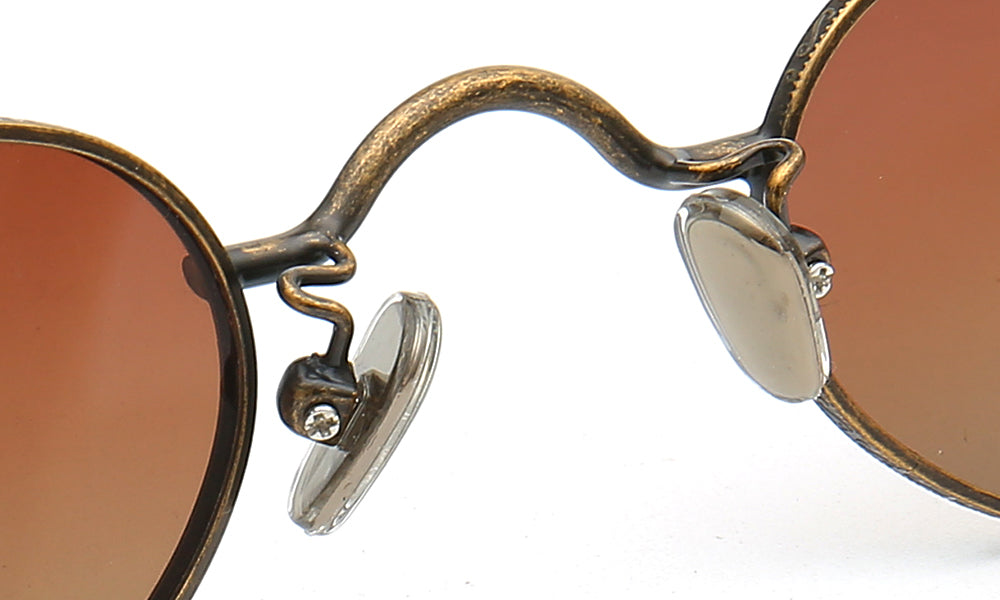 Nose pads of bronze sunglasses with brown lenses