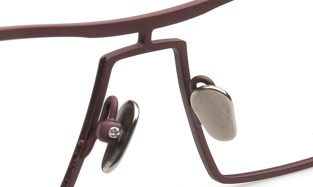 nose pads of brown titanium spectacles 
