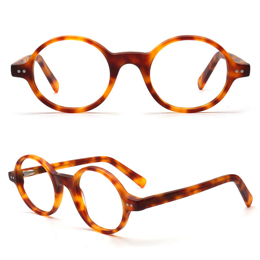 Tortoiseshell eyeglasses on a white background