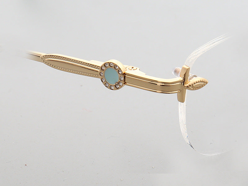 Temple of gold oval rimless eyeglass frames