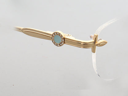 Temple of gold oval rimless eyeglass frames