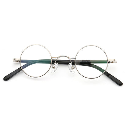 A pair of silver round retro eyeglass frames
