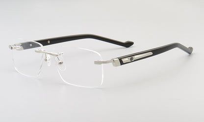 Side view of silver rectangular rimless eyeglasses