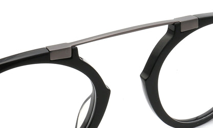Flat top bridge of black and grey acetate eyeglass frames