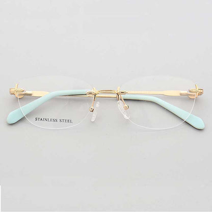 Gold and teal oval rimless eyeglass frames