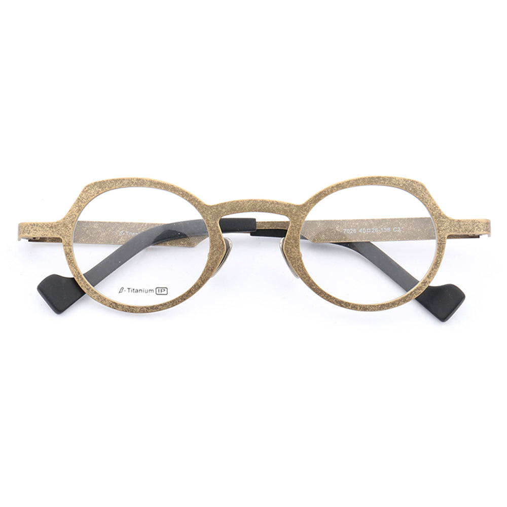 A pair of retro round gold titanium eyeglasses