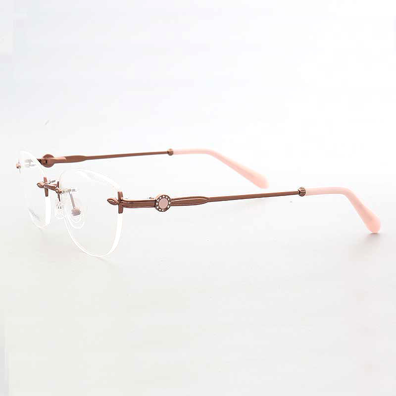 Side view of pink rimless oval eyeglass frames