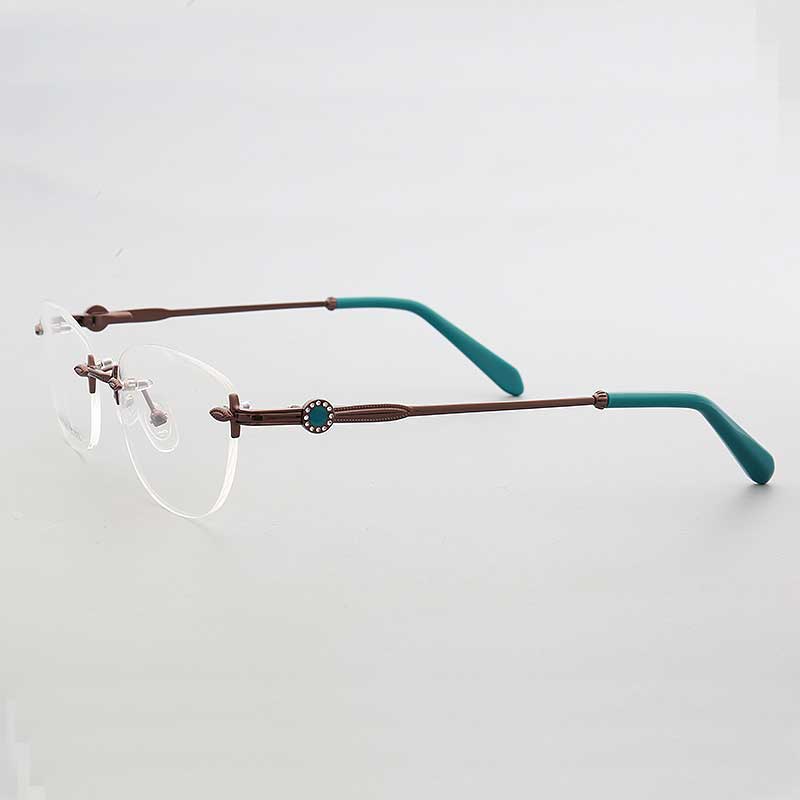 Side view of bronze and teal rimless oval eyeglasses