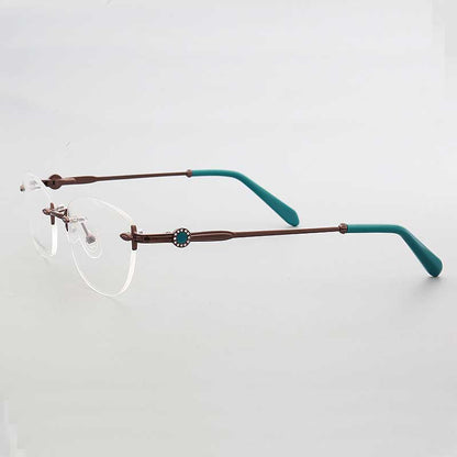 Side view of bronze and teal rimless oval eyeglasses