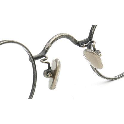 nose pads of vintage round glasses frames