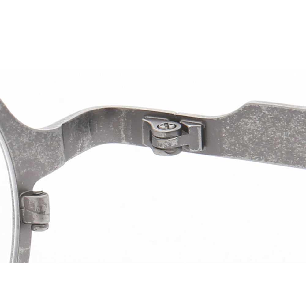 Inner hinge of grey titanium eyeglass frames
