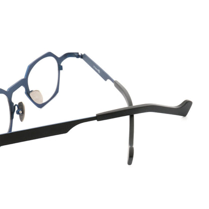 Temple tips of black and blue octagon shaped eyeglasses